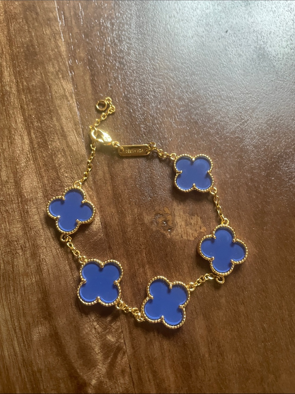 Stainless Steel Gold-Tone Bracelet with Navy Blue Clover